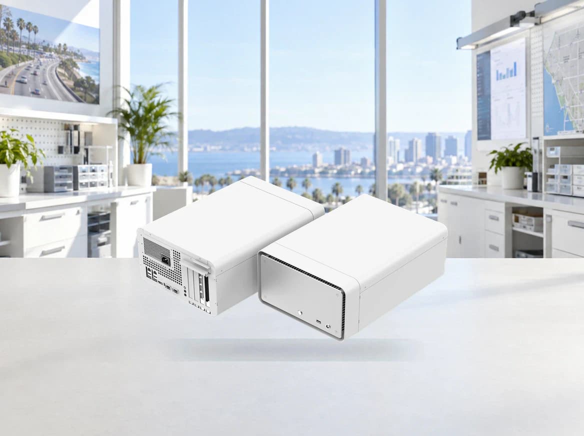 Two white edge-computing systems on a workbench